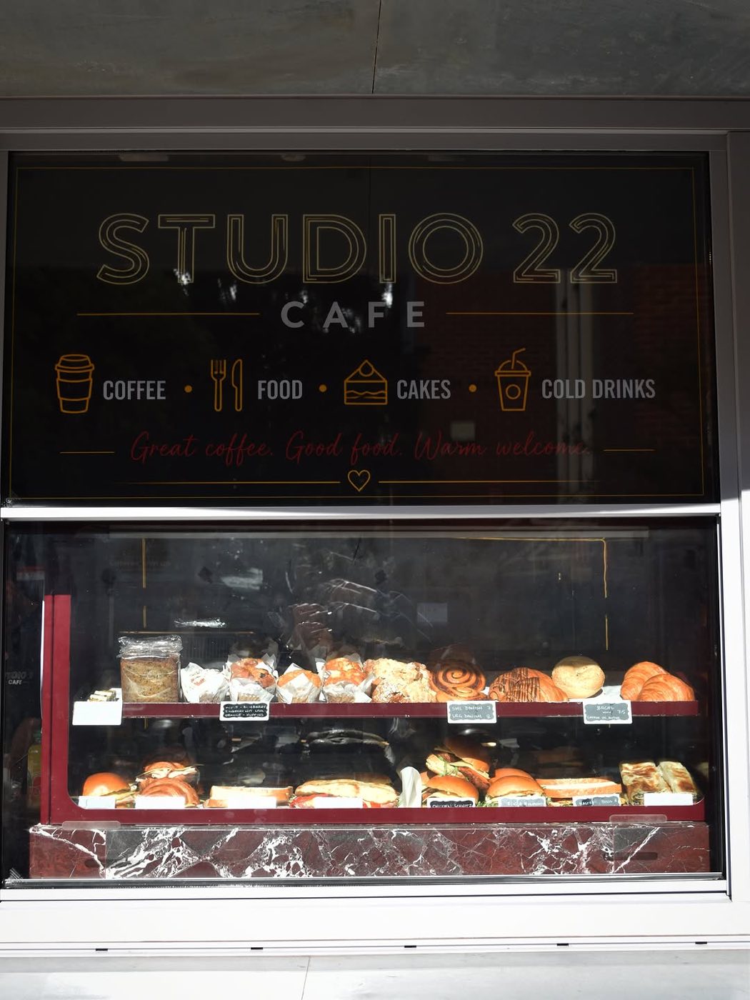Sandwiches, croissants and lunch items in the display case
